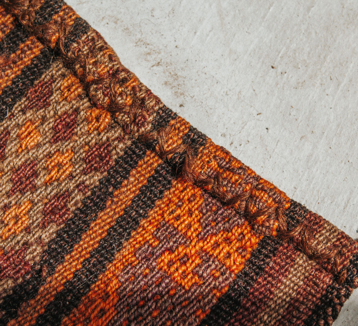 vintage boho handwoven turkish kilim rug throw with tassles in orange and rust colours